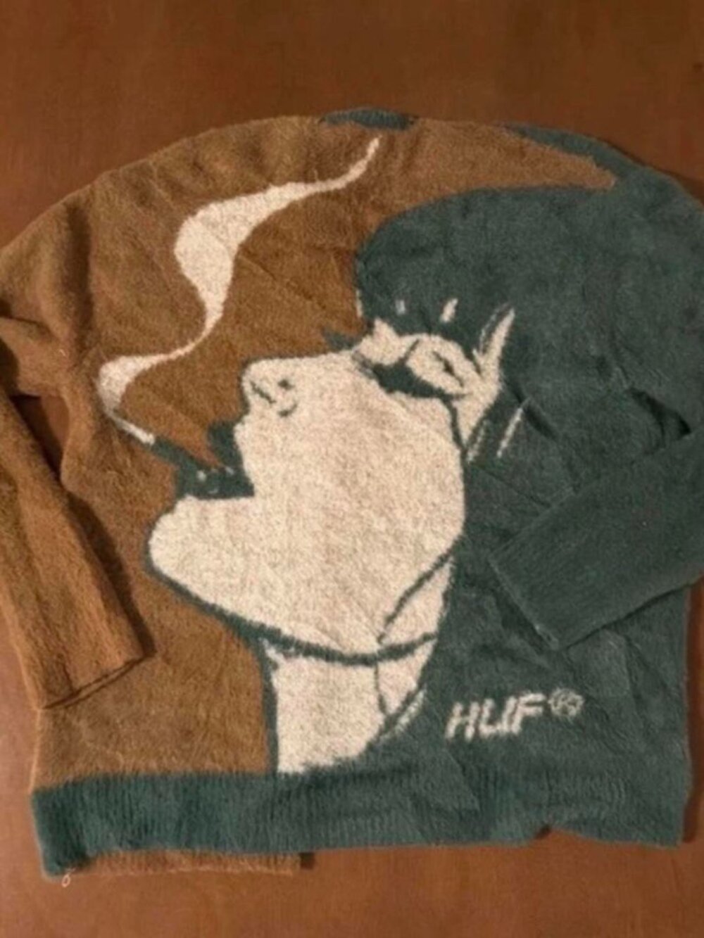 HUF cardigan with graphic of a person smoking, size M (fits like a small)